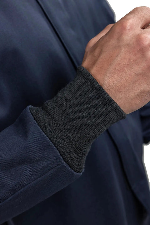 Close-up of Arc Flash Short Coat 12 Cal UltraSoft Navy FR Workwear cuff with black ribbed knit detail.