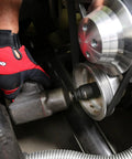 Mechanic using Heavy Duty 19mm Crank Bolt Socket for harmonic balancer removal with impact wrench in auto maintenance