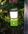 Rechargeable LED Camping Lantern With 3600mAh Power Bank, 4 Light Modes, IPX4 Waterproof, 360 Degree Beam held in rain