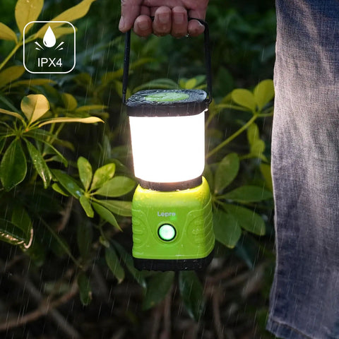 Rechargeable LED Camping Lantern With 3600mAh Power Bank, 4 Light Modes, IPX4 Waterproof, 360 Degree Beam held in rain