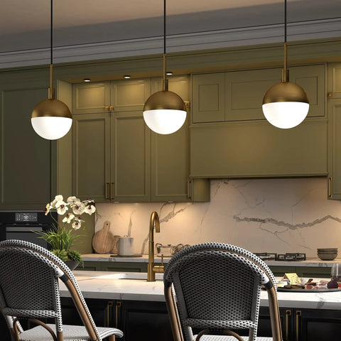 Eight Inch Wide Small Pendant Light With Glass Shade In Brass And White Milk Glass Perfect For Modern Kitchens And Compact Spaces Use In Multiples Over A Kitchen Island For Cohesive Lighting