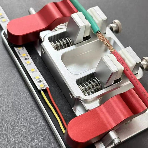 Helping Hands Soldering Station With Double Clamp Design And 12mm Opening Heavy Duty Aluminum Alloy Base Ceramic Clamp holding PCB and wires.