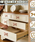 Bow Shaped Dresser Knobs 10 Pack Pink Zinc Alloy Drawer Pulls on white dresser with open drawers showcasing handle detail
