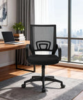 Ergonomic Office Chair With Breathable Mesh Back And Lumbar Support in a modern home office setup by a city view window.