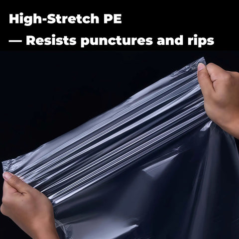 Hands stretching Heavy Duty Nylon Pack Liner Bags 20 By 36 Inch 10 Pack Thick Five Point Five Mil Clear Liners against a black background