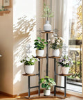 Two Pack 24 Inch Indoor Plant Trellis Set For Climbing Vines And Potted Plants in a bright living room corner