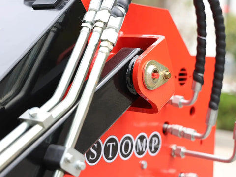 Close-up of Mini Skid Steer Loader With Rotary Plow Tiller Attachment 1800lbs Capacity For Small Jobs On Farms Gardens Parks And Public Spaces