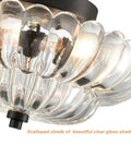 Modern Black Ceiling Light With Scalloped Clear Glass Shade Semi Flush Mount Fixture showcasing detailed glass scallops