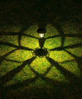 8 Pack Solar Pathway Lights Outdoor 19.8 Inch Tall Metal LED Landscape Lighting illuminating grass with pattern