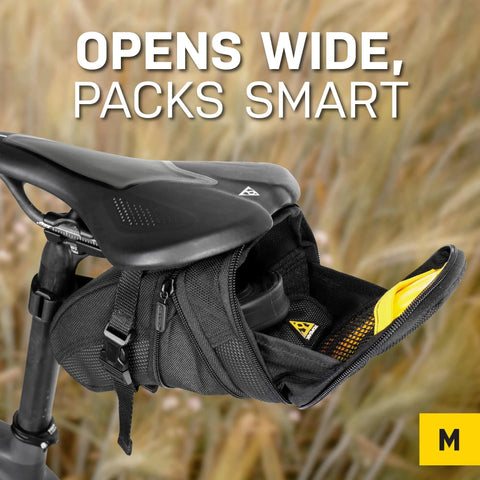 Aero Wedge Saddle Pack With Quick Clip Strap Mount for Bikes, Medium, weatherproof black Cordura, large opening for gear on bike.