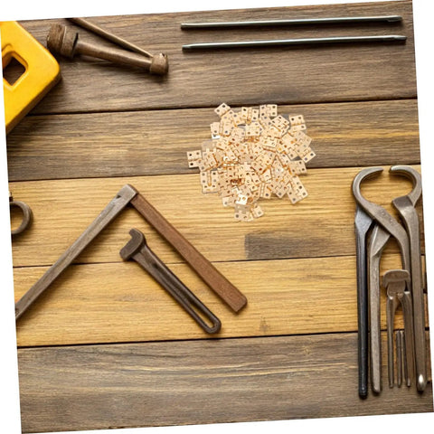 Tiny Brass Door Hinges 8x10mm Set Of 100 For Wooden Jewelry Boxes And Cabinets DIY Craft Projects With Vintage Style Hardware on wood panel