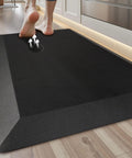 Extra Thick Anti Fatigue Kitchen Mat Nine Tenths Inch Thick Cushioned Standing Desk Mat With Memory Foam Comfort Non Slip Waterproof Rug For Kitchen Floor Office And Sink Twenty By Thirty Two Inches in use in a kitchen setting.