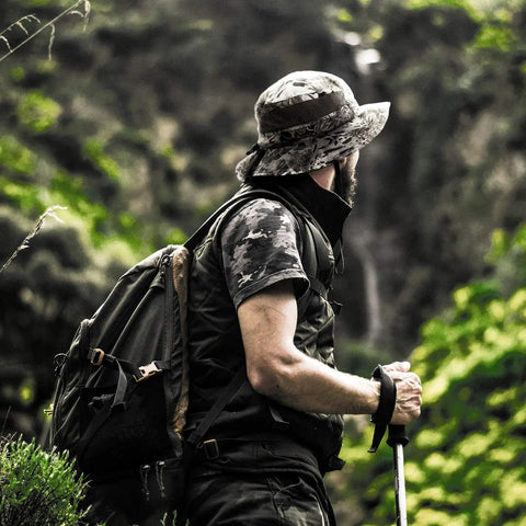 Hiker wearing Sol Armis UPF 50 Boonie Hat For Men And Women, Breathable Sun Protection Fishing Beach Hiking Paddling Hat with Mesh Vents