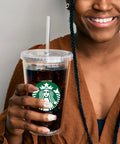 Sip All Day Long With Bulk Pack Custom Clear Acrylic Tumblers 16 Oz Double Wall Insulated Plastic Cups With Lids Straws Bpa Free Personalized Drinkware For Iced Coffee in hand with iced beverage.