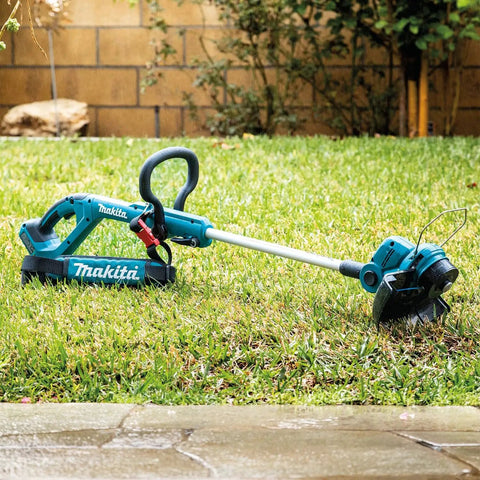 18V Cordless String Trimmer With 180 Degree Rotating Head Converts To Edger, Telescoping Shaft Extends From 48.25 Inches To 56.5 Inches, Five Position Pivot, Compact Design For Precise Trimming And Edging, Tool Only on grass