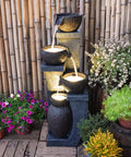 Four Bowl Outdoor Water Fountain With LED Lights Modern Polyresin Floor Fountain for garden, lightweight and weatherproof.