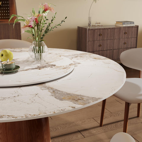 53 Inch Round Dining Table With Smooth Rotating Lazy Susan And Solid Hourglass Base Delivers A Clean Marble Look Top crafted with flowers and dishes