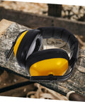 Lock Down Every Distraction Heavy Duty Noise Reduction Earmuffs showing adjustable yellow and black design on wooden surface.