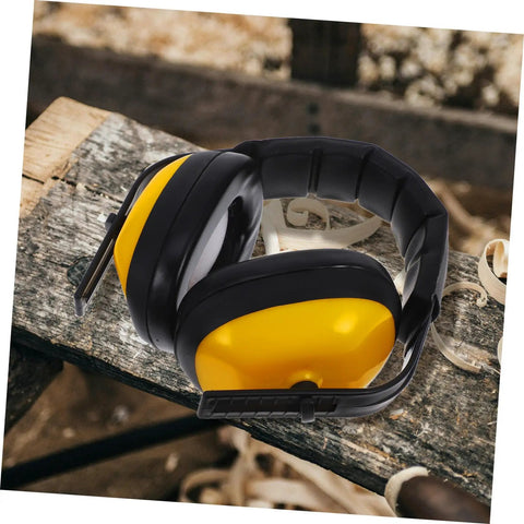 Lock Down Every Distraction Heavy Duty Noise Reduction Earmuffs showing adjustable yellow and black design on wooden surface.