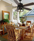 Retractable 36 Inch Farmhouse Rustic Ceiling Fan With Light Caged Style for patio with wicker furniture and wood accents.