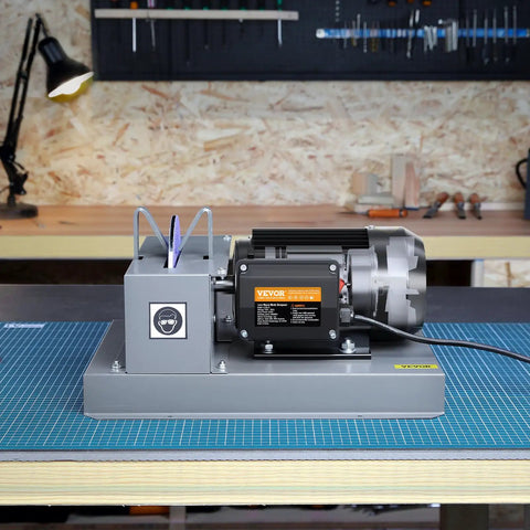 Heavy Duty Lawn Mower Blade Sharpener with a 500 Watt motor and 7-inch grinding wheel on a workbench.