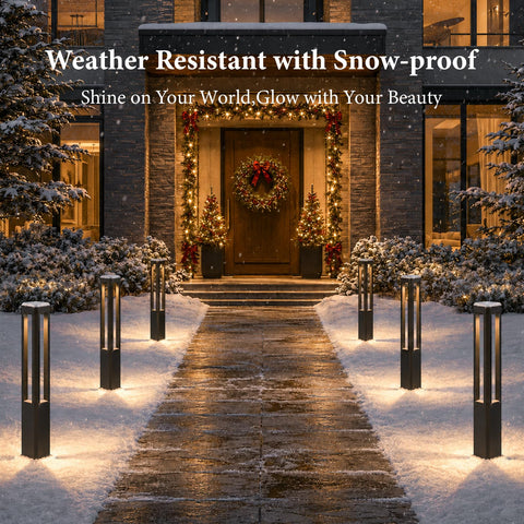 Modern Black LED Pathway Lights Sleek Cone Bollards illuminate a snowy walkway leading to a decorated entrance.