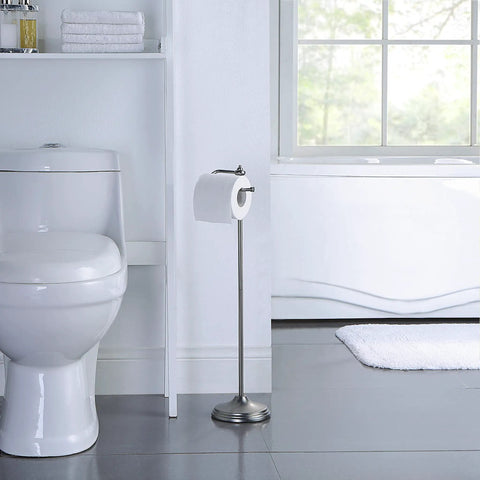 Bathroom scene with a Free Standing Toilet Paper Roll Holder With Reserve Storage, Black Nickel finish, located near a toilet.