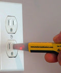 Top Shelf Non Contact Voltage Tester Picks Up 40 To 600 Vac used on wall outlet with clear LED display for electricians.