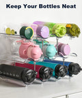 Three Tier Stackable Water Bottle Organizer With Large Compartments, Clear PET Bottle Holder displaying colorful bottles on counter.