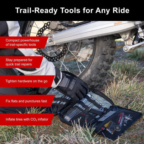 Compact Trail Saver Motorcycle Tool Kit With Axle Wrench 22mm And 27mm Puncture Repair Kit shown by a motorbike tire