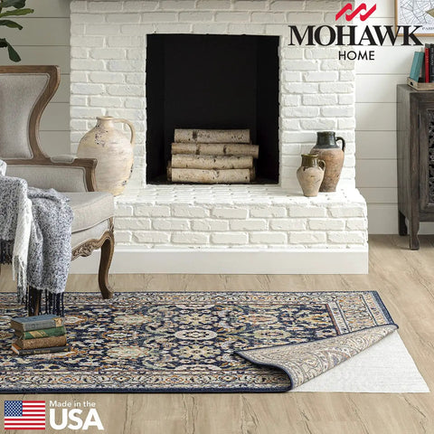 Living room with Non Slip Rug Pad Gripper For Area Rugs 1 Foot 6 Inch By 2 Foot 6 Inch under a decorative rug on wood floor.