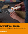 Person using 45mm Rotary Cutter For Fabric, Cuts Through Multiple Layers, Left Or Right Handed, Easy Safe Blade Change tool