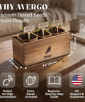 Wildflower Seed Mix Growing Kit with wooden box planter on a wooden table, showing seedlings in soil with labeled markers