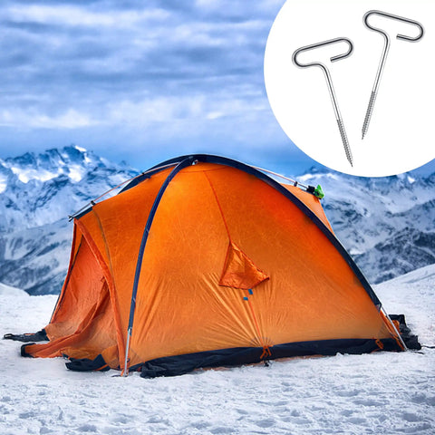 Tent secured with Ice Anchor Drill Adapter Kit With 4 Threaded Peg Stakes For Ice Fishing Shelter Setups on snowy mountain landscape.