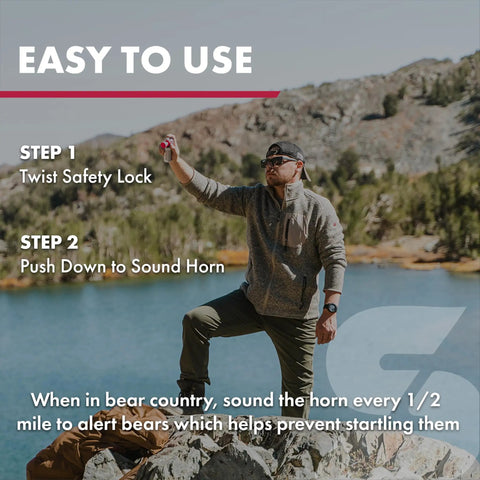 Man demonstrating Frontiersman Max 9.2 oz Bear and Mountain Lion Deterrent With Two Percent Major Capsaicinoids, 40 Ft Range, Glow Kit