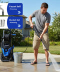 Man using Beast 4800 PSI Pressure Washer with 4 Quick Connect Nozzles, Inlet Hose, Soap Tank, cleaning patio in backyard.