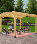 Wooden pergola with black metal bases on stone patio surrounded by greenery, showcasing 4x4 post support for outdoor structures.