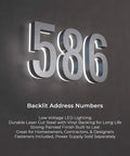 10 Inch Stainless Steel LED House Number Sign With 6000K Bright White Backlight Waterproof Outdoor Address Plate Built To Last In A Sleek Black Finish No Fuss Set Up Easy With 9V DC Power Supply shown lit up on wall