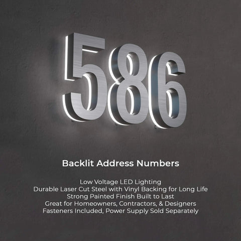 10 Inch Stainless Steel LED House Number Sign With 6000K Bright White Backlight Waterproof Outdoor Address Plate Built To Last In A Sleek Black Finish No Fuss Set Up Easy With 9V DC Power Supply shown lit up on wall