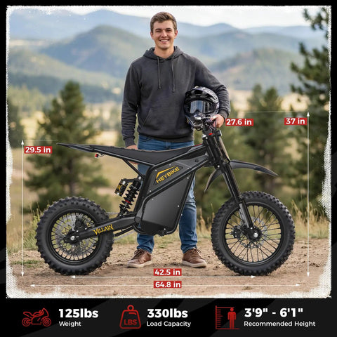 Person standing with Villain 4160W Electric Dirt Bike With 52V 26Ah Battery, showcasing 14 and 12 inch fat tires and dual disc brakes.