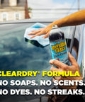Top Shelf Foaming Auto Glass Cleaner Blast Away Road Grime And Bird Droppings From Windshield And Windows Without Leaving Streaks Or Smudges For A Flawless Shine Every Time 19 Ounce Spray Pack Of 2 in use on vehicle windshield.