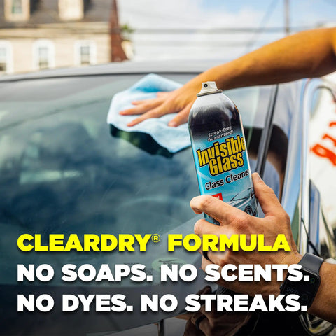 Top Shelf Foaming Auto Glass Cleaner Blast Away Road Grime And Bird Droppings From Windshield And Windows Without Leaving Streaks Or Smudges For A Flawless Shine Every Time 19 Ounce Spray Pack Of 2 in use on vehicle windshield.