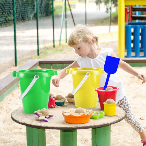 Child playing with Six Pack Kids Beach Buckets And Shovels Set For Outdoor Summer Fun 7 inch large sand pails, sandbox setting