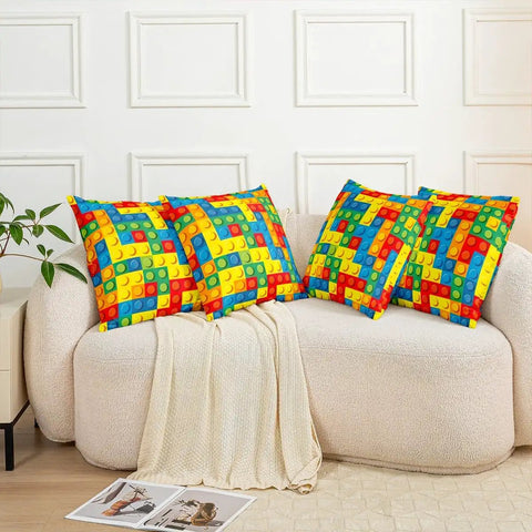 Set Of 2 Reversible Throw Pillow Covers With Color Building Blocks Toy Brick Print, 18x18 Inches, Zipper Closure, Soft 100 Percent Polyester, Cozy Living Room Decor For Home And Kids Rooms, Machine Washable Cushion Covers. four 18x18 inch covers on sofa