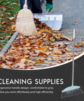 Grime Crushing Heavy Duty Broom With 34 Inch Long Handle For Sweeping Concrete Driveway Garage Patio And Indoor Floors No Sweat Household Cleaner With Convenient Storage Hook in use on leaves.