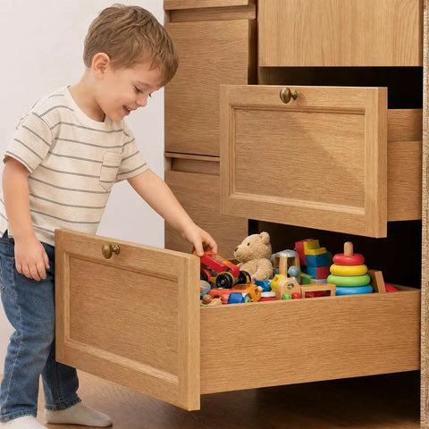 Child exploring toys in a drawer with Smooth As Butter 18 Inch Undermount Drawer Slides Two Pack Soft Close Full Extension Cabinet Hardware.