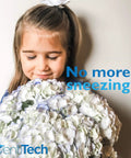 Smiling girl holding white flowers with 'No more sneezing' text on the side.