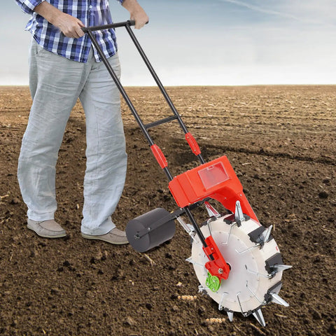 Person using Hand Push Seeder Planter Walk Behind Row Crop Planter With Adjustable Seeding Depth Manual Seeder Machine