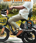 Person riding Folding Electric Trike With Fat Tires And Step Through Frame Three Wheel Ebike For Adults 55 Mile Range 18 MPH Top Speed Off Road Stable Tricycle For Seniors Black 1200W Peak Brushless Motor 624Wh Battery Foldable Design showcasing wide saddle and dual suspension.