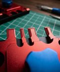 Close-up of a Metal Etching Sheet Bender Tool for Photo Etched Parts and Model Assembly with precision adjustable angles